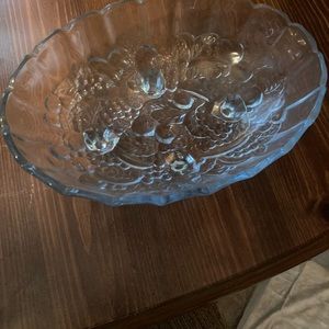 A clear blue bowl vintage Indiana glass footed Grape fruit bowl
